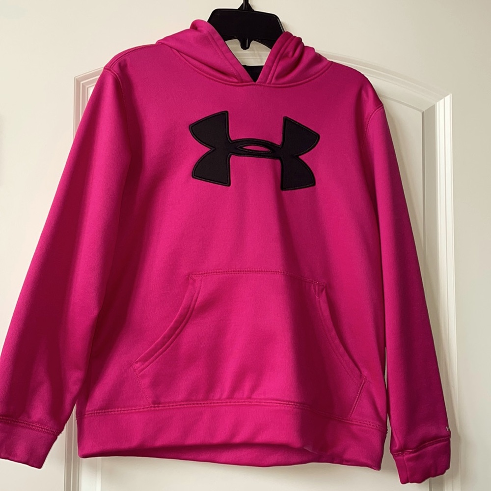 Under Armour girls medium hoodie sweatshirt. Color is a dark pink.